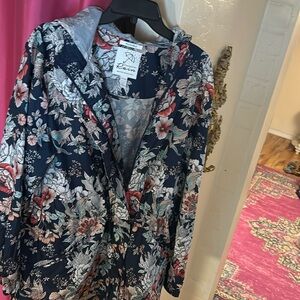 Hooded, packable jacket